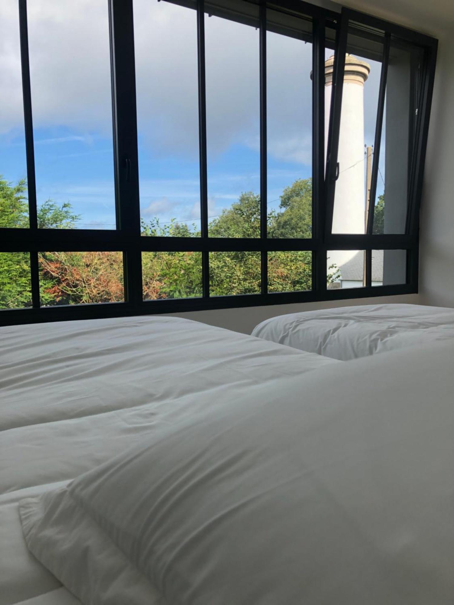 Les Ecolodges Sous Le Phare Louannec Extérieur photo